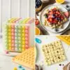 Silikonowa forma kwadratowa DecorPop! Zrób gofry lub czekoladę w kształcie Pop It. Zamów dziś do 13:00 i ciesz się nią już w kolejny dzień roboczy!