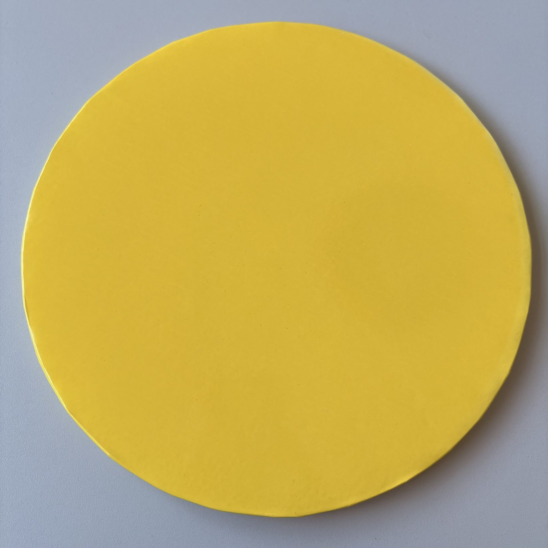 Podkład pod tort okrągły Żółty Ø 25 cm, h 1 cm - PC Julita OUTLET